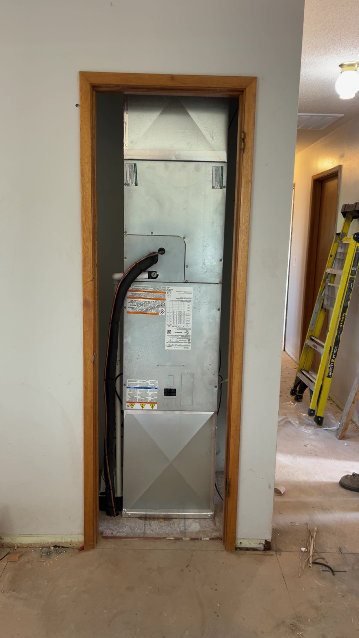 Goodman gas furnace with ductwork installed in residential utility closet Yakima WA