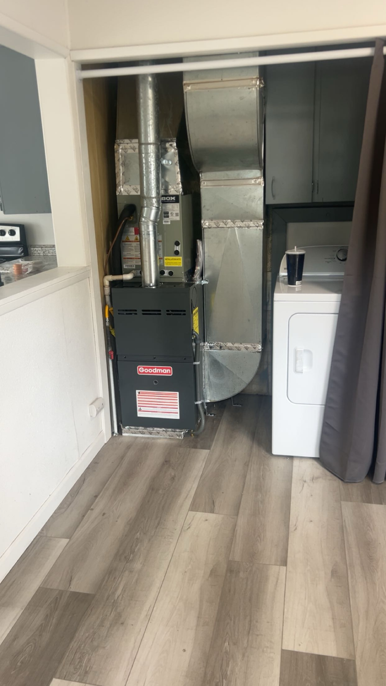 Vertical air handler installed in closet doorway HVAC system replacement Yakima WA